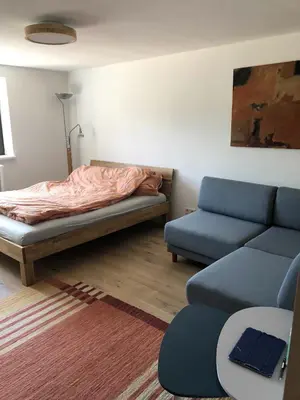 Ein Bett oder Betten in einem Zimmer der Unterkunft Ferien direkt am Wasser