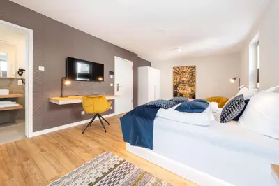 Ein Bett oder Betten in einem Zimmer der Unterkunft Design Apartments Potsdam - Luise