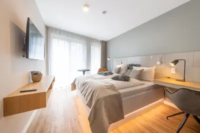 Ein Bett oder Betten in einem Zimmer der Unterkunft Design Apartments Potsdam - Luise