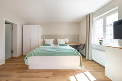 Ein Bett oder Betten in einem Zimmer der Unterkunft Design Apartments Potsdam - Luise
