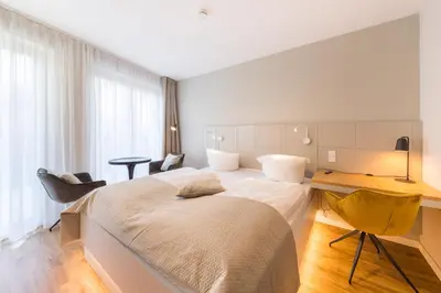 Ein Bett oder Betten in einem Zimmer der Unterkunft Design Apartments Potsdam - Luise