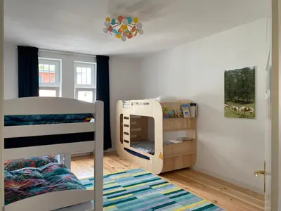 Ein Bett oder Betten in einem Zimmer der Unterkunft NEU ausgestattete Wohnung in Berlin - ruhige Lage
