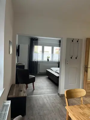 Ein Bett oder Betten in einem Zimmer der Unterkunft Kahnstübchen Mit NEUEM Innenhof Garten