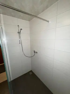 Ein Badezimmer in der Unterkunft Bungalowdorf Lübben