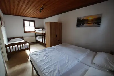 Ein Bett oder Betten in einem Zimmer der Unterkunft Bungalowdorf Lübben