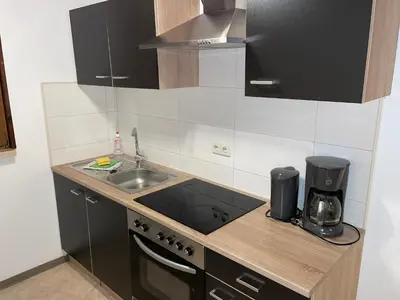 Küche/Küchenzeile in der Unterkunft Bungalowdorf Lübben