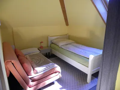 Ein Bett oder Betten in einem Zimmer der Unterkunft Ferienwohnung an der Schorfheide
