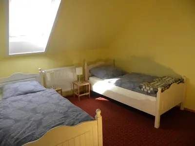 Ein Bett oder Betten in einem Zimmer der Unterkunft Ferienwohnung an der Schorfheide