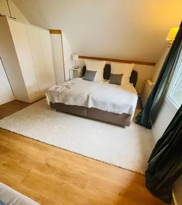 Ein Bett oder Betten in einem Zimmer der Unterkunft Familienurlaub bei Berlin mit 3 Schlafzimmern