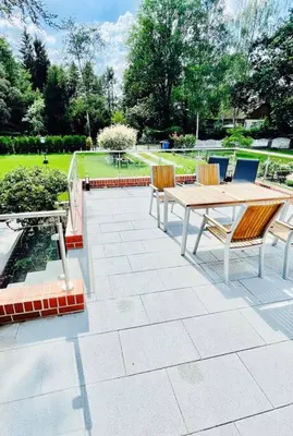 Ein Garten an der Unterkunft Familienurlaub bei Berlin mit 3 Schlafzimmern