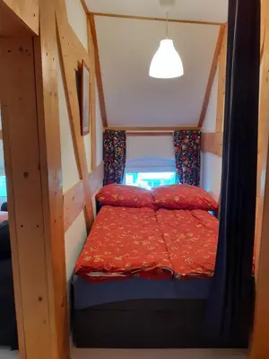 Ein Bett oder Betten in einem Zimmer der Unterkunft Ferienwohnung Martinsblick