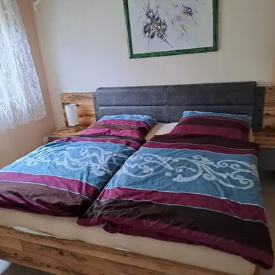 Ein Bett oder Betten in einem Zimmer der Unterkunft Häuschen am Waldrand