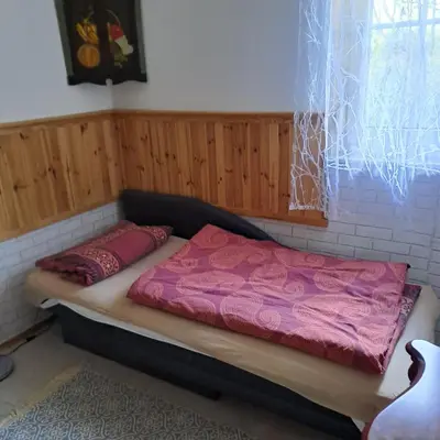 Ein Bett oder Betten in einem Zimmer der Unterkunft Häuschen am Waldrand