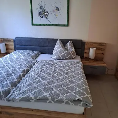 Ein Bett oder Betten in einem Zimmer der Unterkunft Häuschen am Waldrand