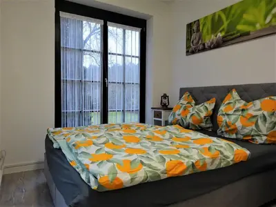 Ein Bett oder Betten in einem Zimmer der Unterkunft Ferienanlage Waschbär Country