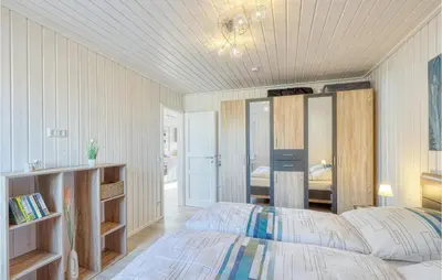 Ein Bett oder Betten in einem Zimmer der Unterkunft Gorgeous Home In Zerpenschleuse