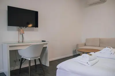Ein Bett oder Betten in einem Zimmer der Unterkunft Arbio I Apartmently Studios & Apartments