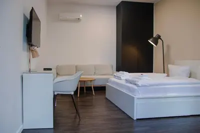 Ein Bett oder Betten in einem Zimmer der Unterkunft Arbio I Apartmently Studios & Apartments