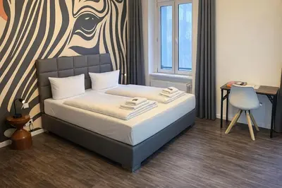 Ein Bett oder Betten in einem Zimmer der Unterkunft Arbio I Apartmently Studios & Apartments