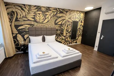 Ein Bett oder Betten in einem Zimmer der Unterkunft Arbio I Apartmently Studios & Apartments