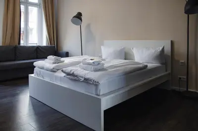 Ein Bett oder Betten in einem Zimmer der Unterkunft Arbio I Apartmently Studios & Apartments