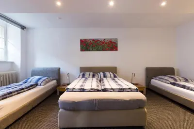 Ein Bett oder Betten in einem Zimmer der Unterkunft Bergmann Kiez. The place to be!