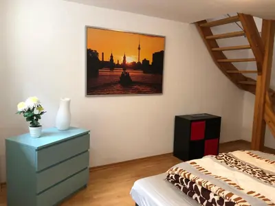 Ein Bett oder Betten in einem Zimmer der Unterkunft TOP SPOT MITTE . THE PLACE TO BE !