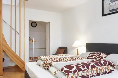 Ein Bett oder Betten in einem Zimmer der Unterkunft TOP SPOT MITTE . THE PLACE TO BE !