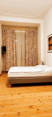 Ein Bett oder Betten in einem Zimmer der Unterkunft Pension Thomas Rooms