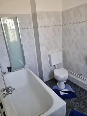 Ein Badezimmer in der Unterkunft FEWO NEUBEEREN