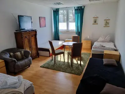 Ein Bett oder Betten in einem Zimmer der Unterkunft FEWO NEUBEEREN
