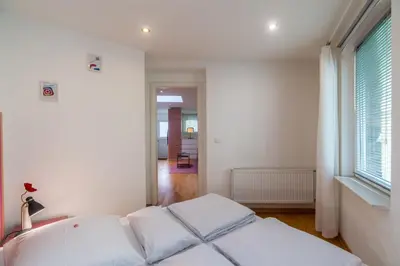 Ein Bett oder Betten in einem Zimmer der Unterkunft Urban Duplex Kreuzberg