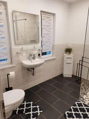 Ein Badezimmer in der Unterkunft Bungalow Lange