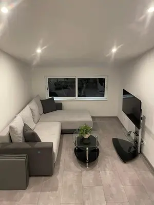 Ein Sitzbereich in der Unterkunft Bungalow Lange