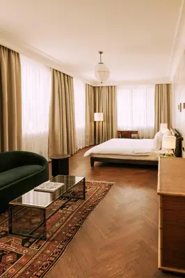 Ein Bett oder Betten in einem Zimmer der Unterkunft Boutique Hotel Château Royal