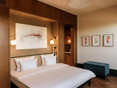 Ein Bett oder Betten in einem Zimmer der Unterkunft Boutique Hotel Château Royal
