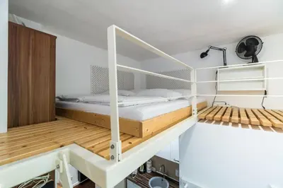 Ein Bett oder Betten in einem Zimmer der Unterkunft Urban Stuck Kreuzberg