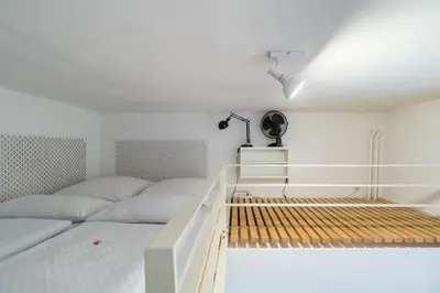 Ein Bett oder Betten in einem Zimmer der Unterkunft Urban Stuck Kreuzberg