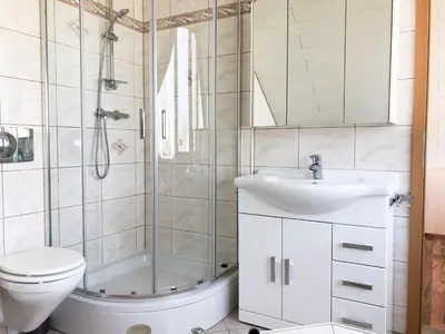 Ein Badezimmer in der Unterkunft Ferienhaus direkt an der Spree mit Whirlpool und Sauna