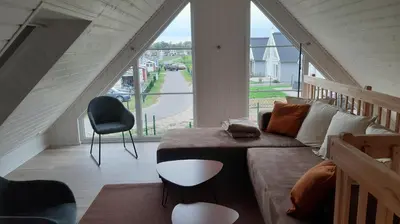 Ein Sitzbereich in der Unterkunft Ferienhaus 'Irene'