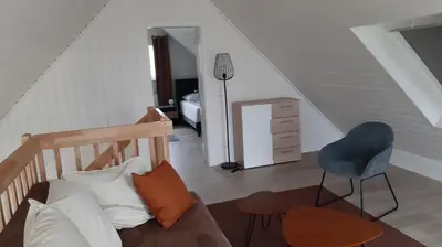 Ein Sitzbereich in der Unterkunft Ferienhaus 'Irene'