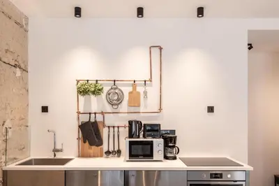 Küche/Küchenzeile in der Unterkunft Factory Loft Duplex -40sqm- near Antonplatz