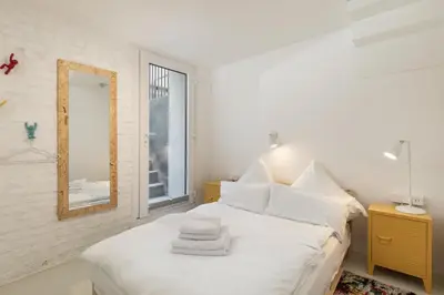 Ein Bett oder Betten in einem Zimmer der Unterkunft Scandinavian Loft Duplex -50sqm- near Antonplatz