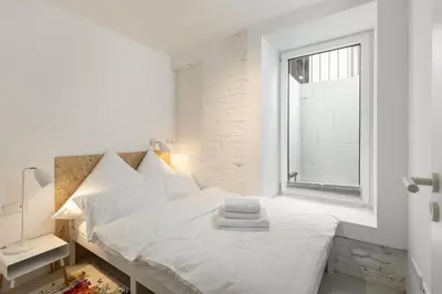 Ein Bett oder Betten in einem Zimmer der Unterkunft Scandinavian Loft Duplex -50sqm- near Antonplatz