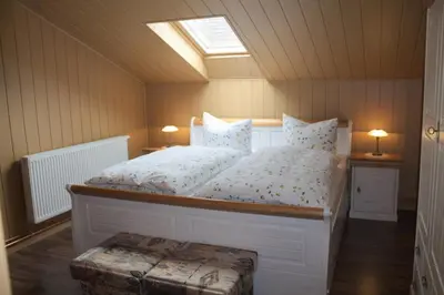 Ein Bett oder Betten in einem Zimmer der Unterkunft Spreewälder Schwalbenhof - Ferienwohnung 