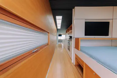 Ein Bett oder Betten in einem Zimmer der Unterkunft JULIA - Schwimmendes Apartment