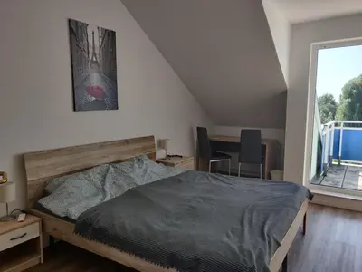 Ein Bett oder Betten in einem Zimmer der Unterkunft Fewo Bernau
