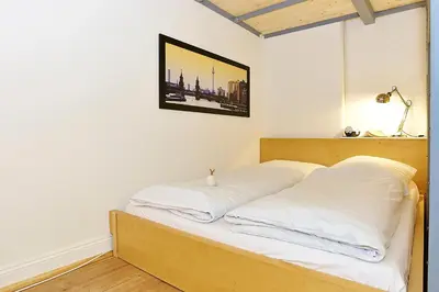 Ein Bett oder Betten in einem Zimmer der Unterkunft Urban Art Kreuzberg