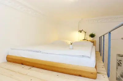Ein Bett oder Betten in einem Zimmer der Unterkunft Urban Art Kreuzberg