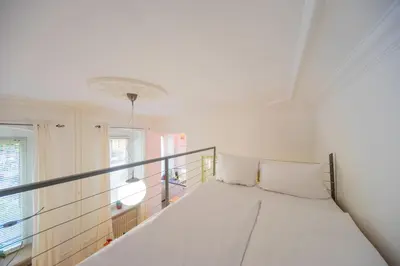Ein Bett oder Betten in einem Zimmer der Unterkunft Urban Pistazie Kreuzberg